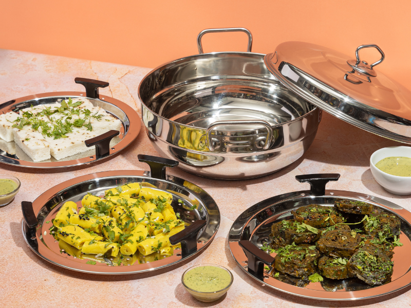Vinod Stainless Steel 7 pcs Deluxe Multi Kadai (Induction Friendly) with Stainless Steel lid, 2 idli Plates, 2 dhokla Plates, 1 patra Plate and 1 Mini idli Plate - Premium multikadhai from vinod - Just Rs. 2699! Shop now at Surana Sons